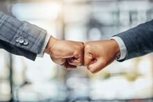 I Support You Every Step Of The Way. Shot Of Two Unrecognizable Lawyers Giving Each Other A Fist Bump At Work.