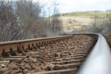 rails. railway embankment. photo during the day.