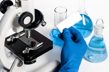 Research in medical laboratory with microscope equipment, close up