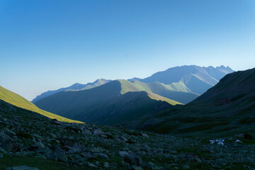 Wall Mural - The mountain valleys of the Teberda Nature Reserve in Karachay-Cherkessia in the early morning dawn