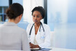 © Adene Sanchez/peopleimages.com - Any symptoms I should be aware of. Cropped shot of a female doctor talking to a patient in her office.