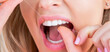 Oral hygiene and health care. Smiling women use dental floss white healthy teeth. Dental flush - woman flossing teeth. Dental floss. Taking care of teeth. Healthy teeth concept. Teeth Flossing