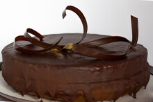 The Sacher Cake, Sachertorte. Austrian Chocolate Cake, Consisting Of Two Plates Of Chocolate Sponge Cake And A Thin Layer Of Apricot Jam, Horizontal