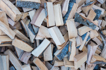 Wall Mural - stacked logs of firewood texture background 