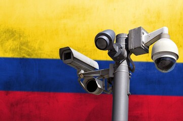 Closed circuit camera Multi-angle CCTV system against the background of the national flag of Colombia.