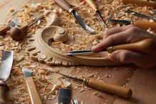 Carpenter Wood Carving Equipment. Woodworking, Craftsmanship And Handwork Concept. Wood Processing. Joinery Work Wood Carving Chisels For Carving On The Woodworker Desk Timber Joinery Work.