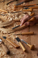 Canvas Print - Carpenter wood carving equipment. Woodworking, craftsmanship and handwork concept. Wood processing. Joinery work Wood carving Chisels for carving on the woodworker desk Timber Joinery work.