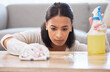 © Jade M/peopleimages.com - I think I missed a spot. Shot of a young woman cleaning a surface at home.