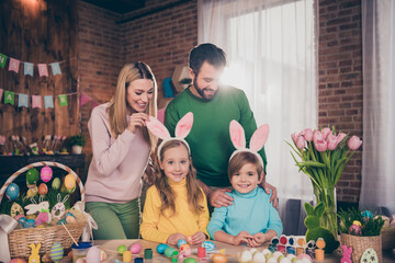 Poster - Portrait of four friendly cheerful people hands touch rabbit ears headband house indoors