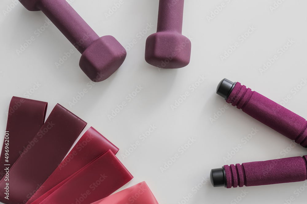 Stylish sport equipment on white table