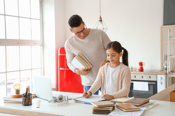 Wall Mural - Little girl studying with tutor at home