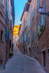 Wall Mural - Narrow street in the old town of Urbino in Italy