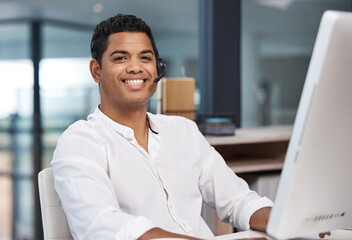 Wall Mural - customer focused to ensure customer satisfaction. portrait of a young businessman working on a compu