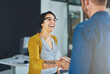 © Delmaine Donson/peopleimages.com - Happy at the opportunity to work together. Cropped shot of businesspeople shaking hands in an office.