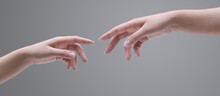 Female Hands Reaching Each Other