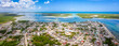 © Alexey Oblov - Aerial landscape overlooking the city of Rio Lagartos. The city is surrounded by a beautiful river with azure water. Fishing boats are moored to the shore. Yucatan, Mexico