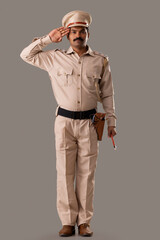 Wall Mural - Portrait of an Indian policeman saluting