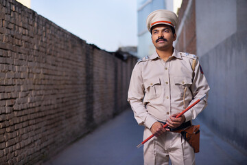 Wall Mural - Portrait of an Indian policeman while on duty