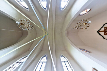 Wall Mural - interior dome and looking up into a old gothic or baroque catholic  church ceiling with columns