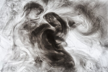 Dark smoke on white ink background, colorful fog, abstract swirling ocean sea, acrylic paint pigment underwater