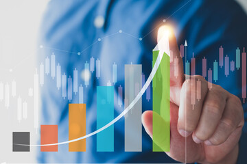 Businessman analysing economic growth graph financial data on laptop. Stock market investment. Financial and banking Technology. Business strategy and digital marketing concept.