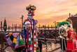 Sunset at Venice Festival, colourful costumes, Venice, Italy