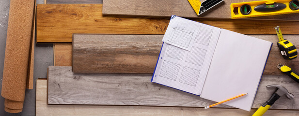 Canvas Print - Wood laminate and tools on floor background texture. Wooden laminate top view