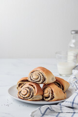 Wall Mural - Sweet homemade poppy seed buns with milk for the breakfast