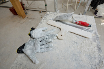 Wall Mural - Attic finishing construction site in the phase drywall spackling and plastering before screeding