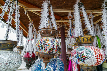 Wall Mural - Blue evil eye ;nazar boncugu, turkish symbols hanging on a tree. cappadocia