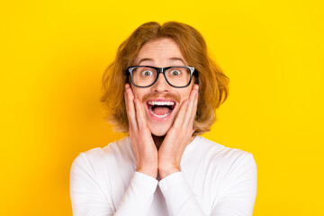 Sticker - Photo of excited funky guy wear white shirt spectacles arms cheeks isolated yellow color background