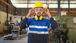 © bung - Portrait of two engineers standing in the CNC factory. Remove safety glasses in the production line with smile. High technology of machine. Industrial and good workplace concept