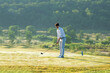 © freebird7977 - Golfer sport course golf ball fairway.  People lifestyle man playing game golf tee off on the green grass.  Asian man player game shot in summer.  Healthy and Sport outdoor