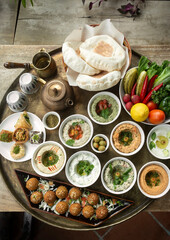 Wall Mural - mixed middle eastern meze sharing food platter in turkish restaurant