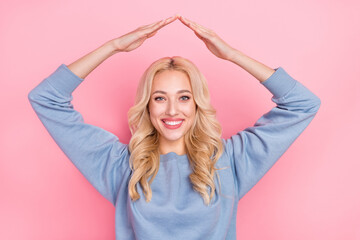 Sticker - Photo of young adorable girl hands above head settlement safe relocation isolated over pink color background