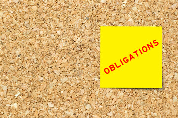 Poster - Yellow note paper with word obligations on cork board background with copy space