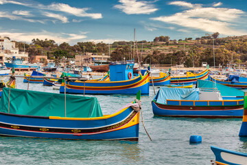 Wall Mural - Marsaxlokk harbor with multicoloured boats Malta