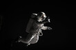 © supamotion - Caucasian female astronaut using her mobile phone during spacewalk, messaging, taking pictures