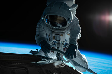 Wall Mural - female astronaut performing spacewalk, working on a outer part of a space craft