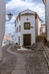 Poster - cobblestone streets and picturesque houses in the old city center of Marvao