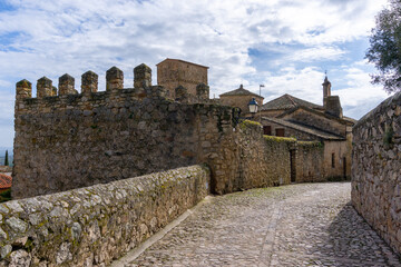 Sticker - cobblestone street leading uphill into the picturesque old city center of Trujillo