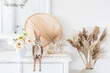 © Connect Images - Wooden bunny and pampas grass spring home decor