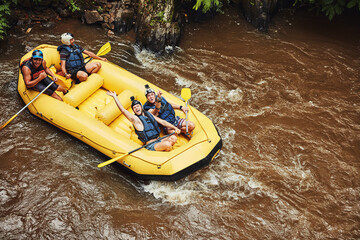 Sticker - Life is either a daring adventure or nothing at all. Shot of a group of friends out river rafting on a sunny day.