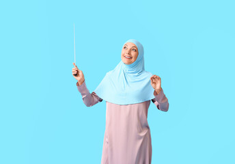 Sticker - Muslim music teacher on color background