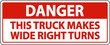 © Seetwo - Danger Truck Makes Wide Right Turns Label Sign On White Background