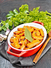 Wall Mural - Carrots fried in pan on napkin