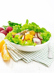 Poster - Salad of radish and orange with mint on wooden board