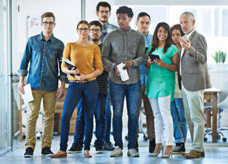 Aufkleber - Everybody brings a different skill to the team. Portrait of a diverse group of coworkers standing in an office.