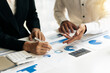 © PaeGAG - Business team brainstorming and discussing with financial data and report graph. Teamwork meeting working concept.