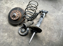 Leaf Spring And Shock Absorber Of The Mini Truck In The Garage